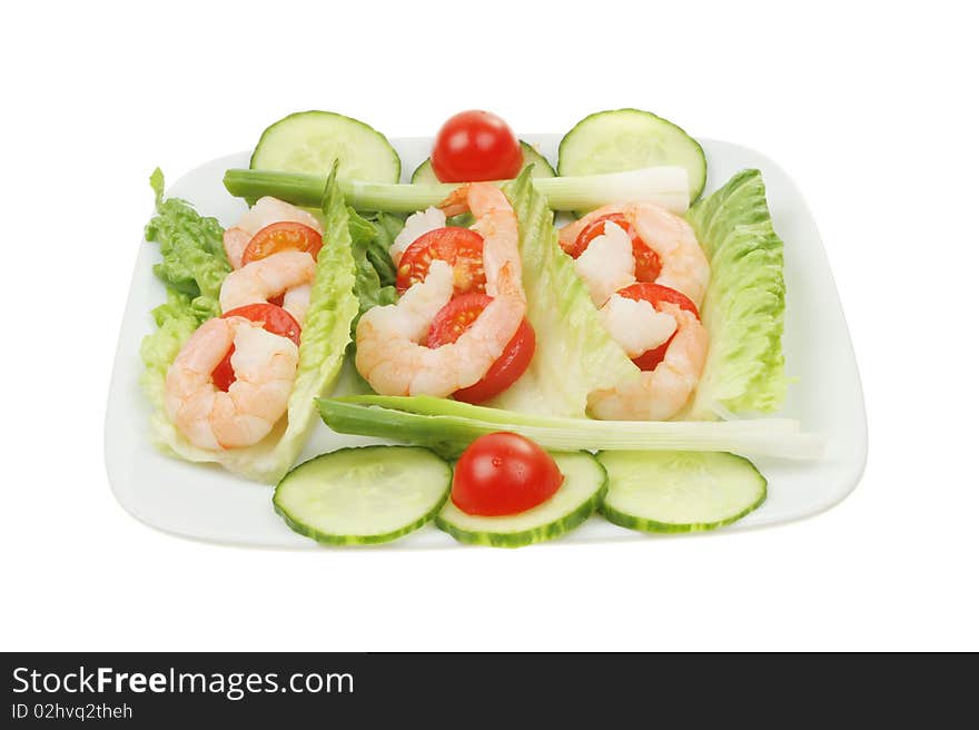 Prawn salad on a plate isolated against white