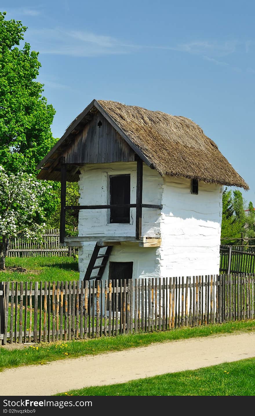 Old house with roof from straw in forest, cottage from Czech republic. Old house with roof from straw in forest, cottage from Czech republic