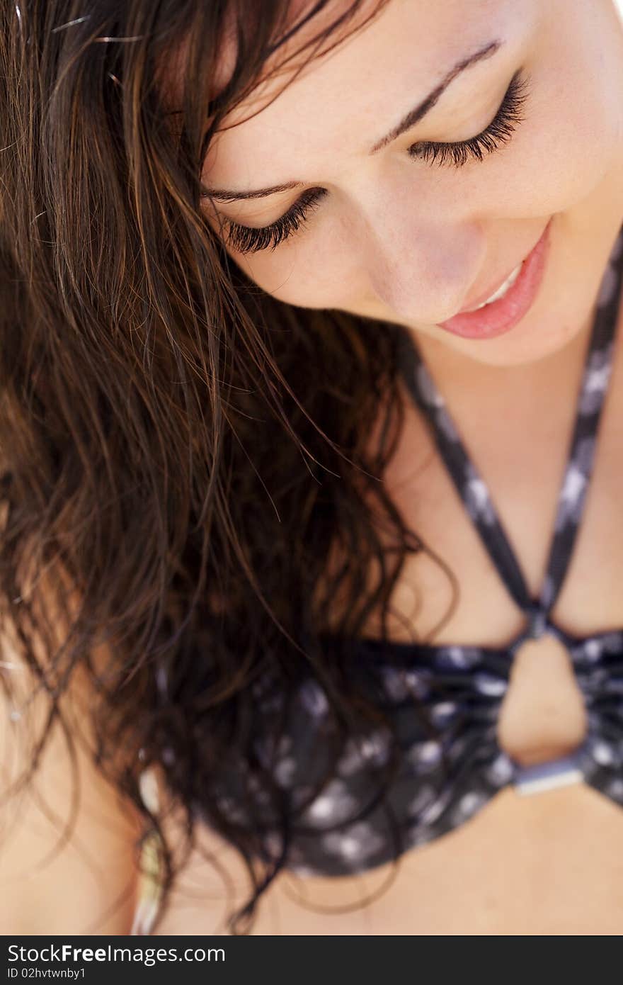 Young beautiful close girl portrait wearing bikini.