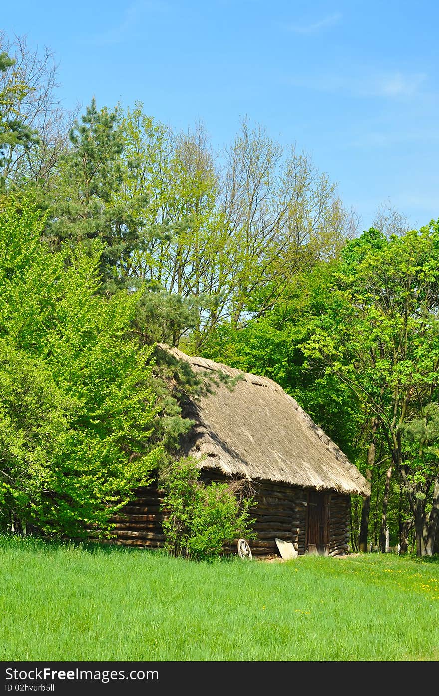 Old house with roof from straw in forest, cottage from Czech republic. Old house with roof from straw in forest, cottage from Czech republic