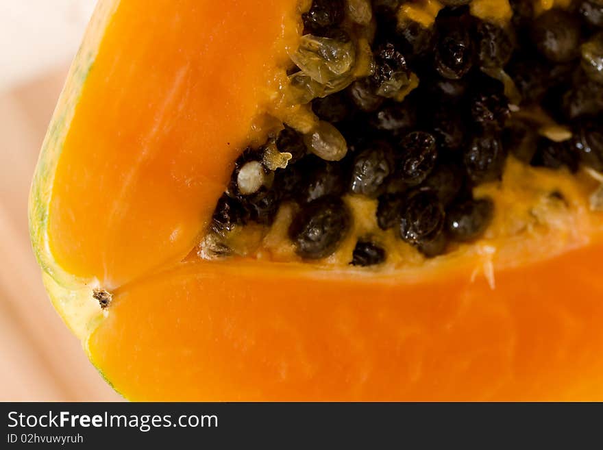 Papaya Fruit on the wooden background