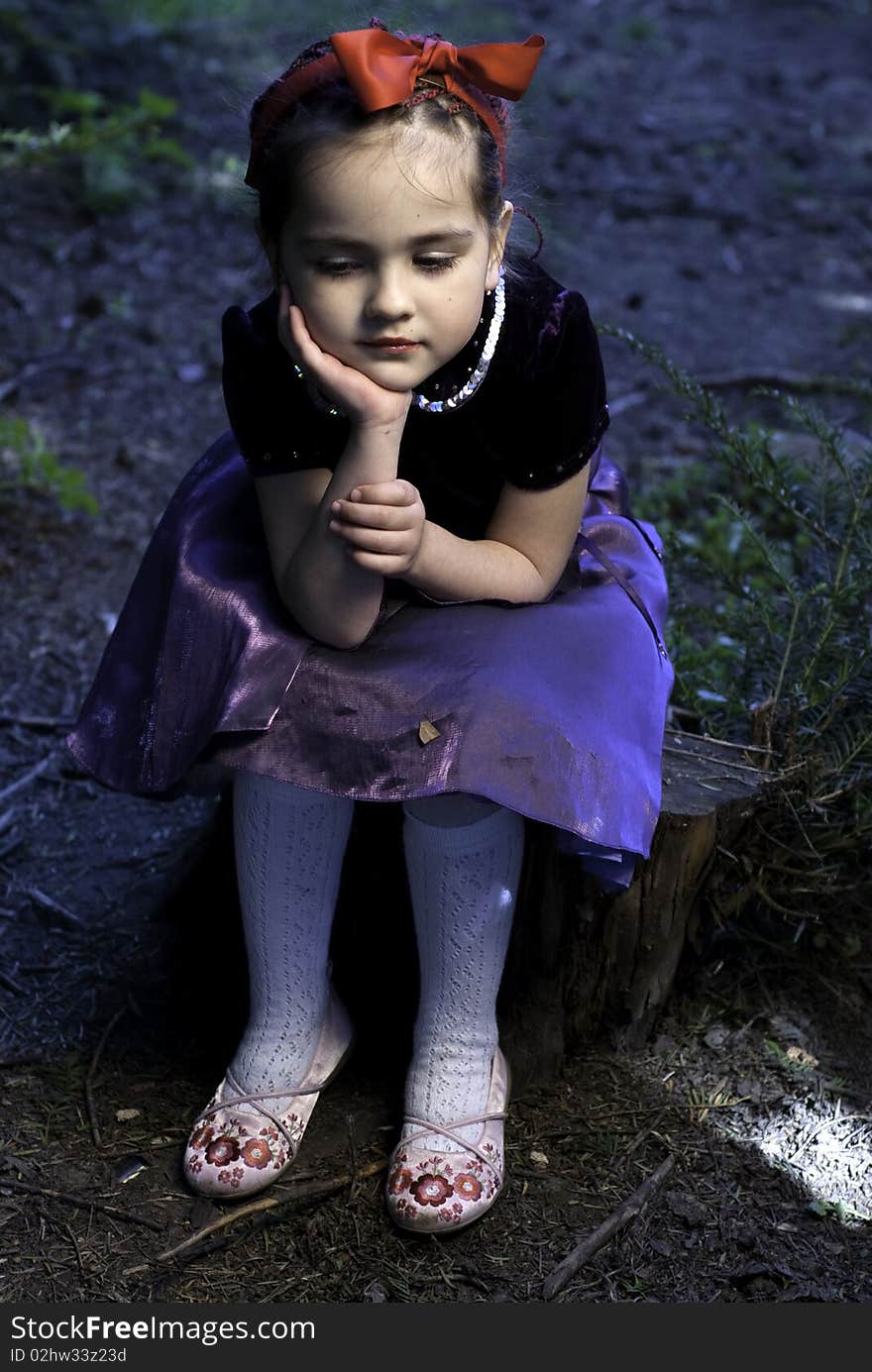 Snow white little girl in forest