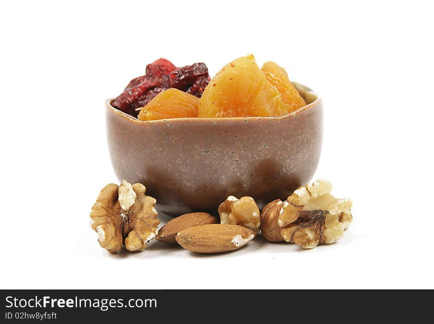 Red ripe dried cranberries on a reflective white background. Red ripe dried cranberries on a reflective white background