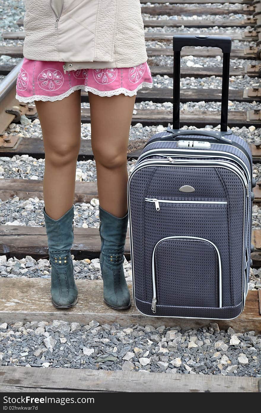 Pink short skirt, train tracks