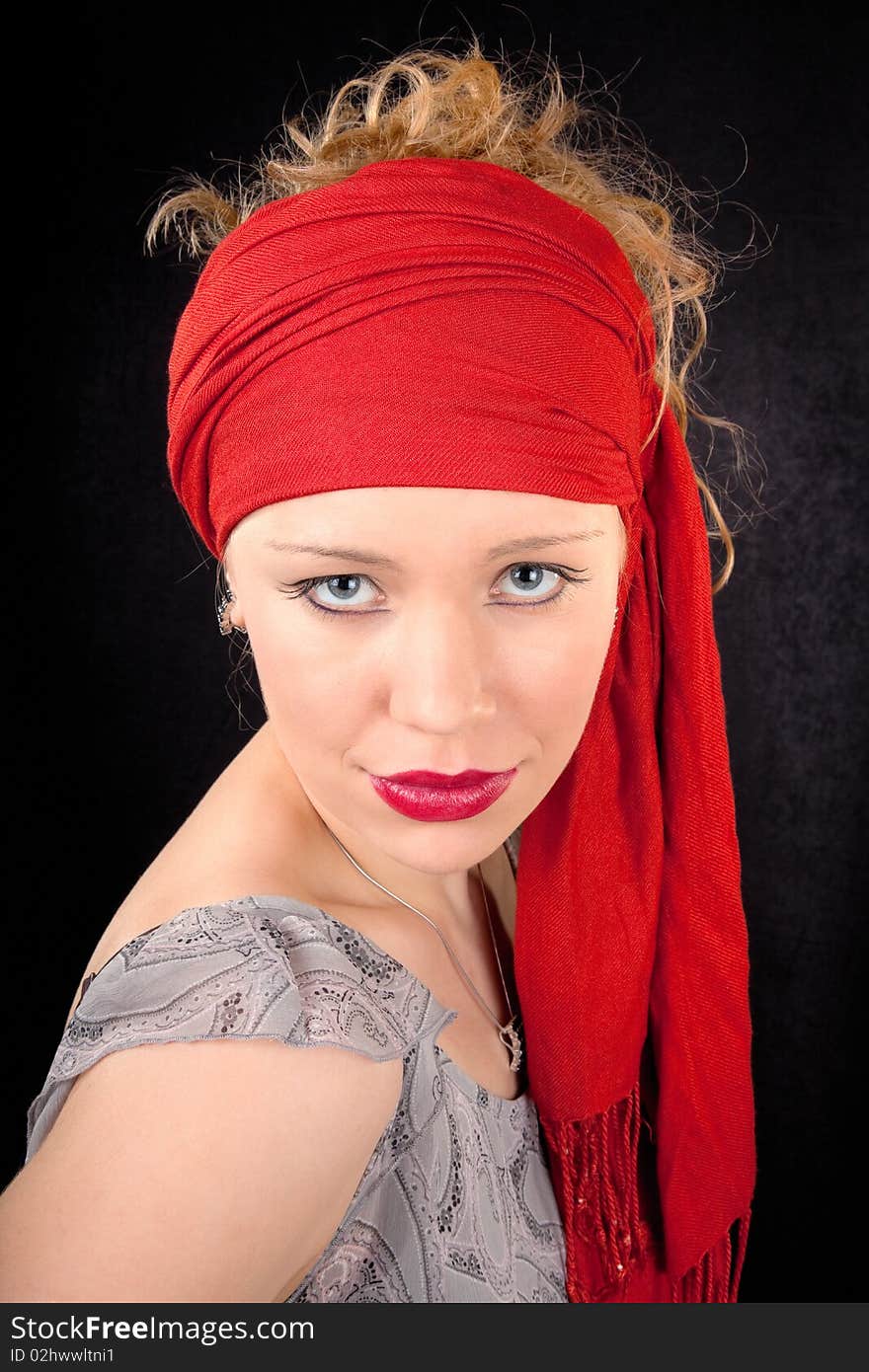 Portrait of a young girl in red color. Portrait of a young girl in red color