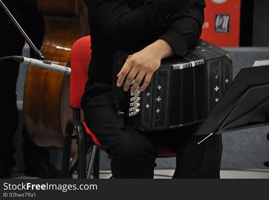 Bandoneon player at a concert