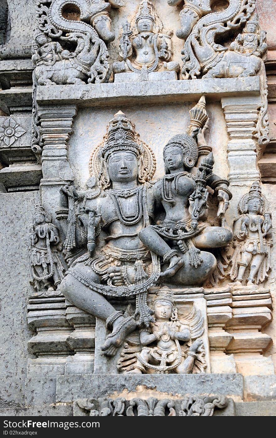 Ancient sculptures in ruins at an indian temple