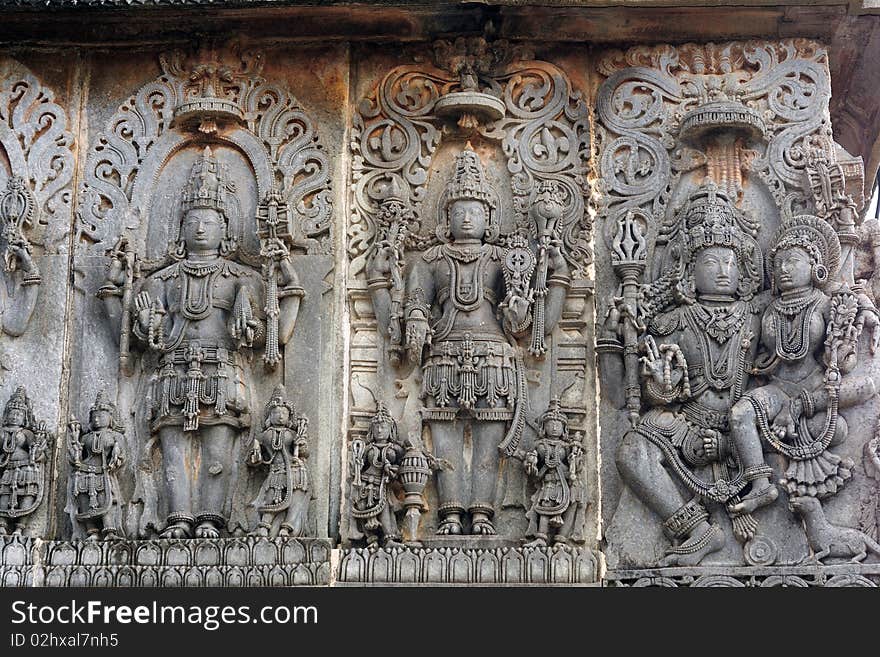 Ancient sculptures in ruins at an indian temple