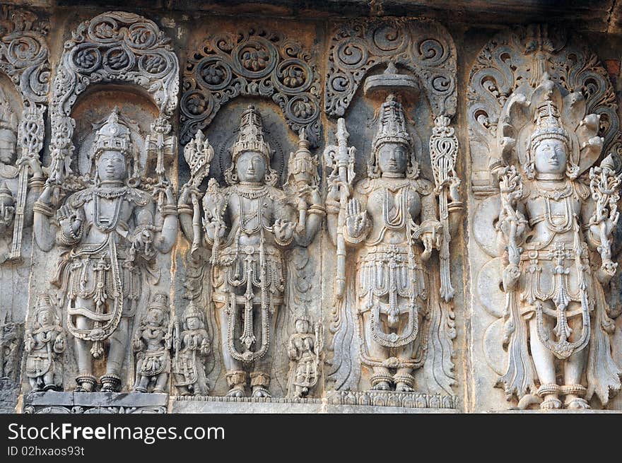 Ancient sculptures in ruins at an indian temple