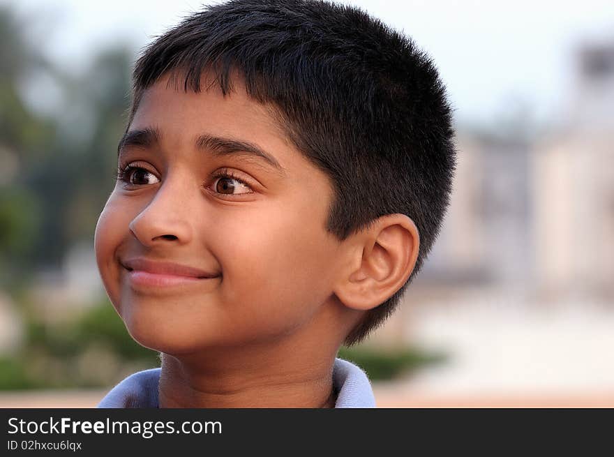 Photo of adorable young boy looking at camera. Photo of adorable young boy looking at camera