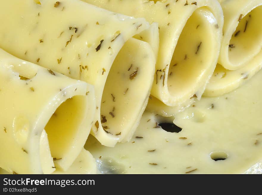 Four slices of rolled green cheese