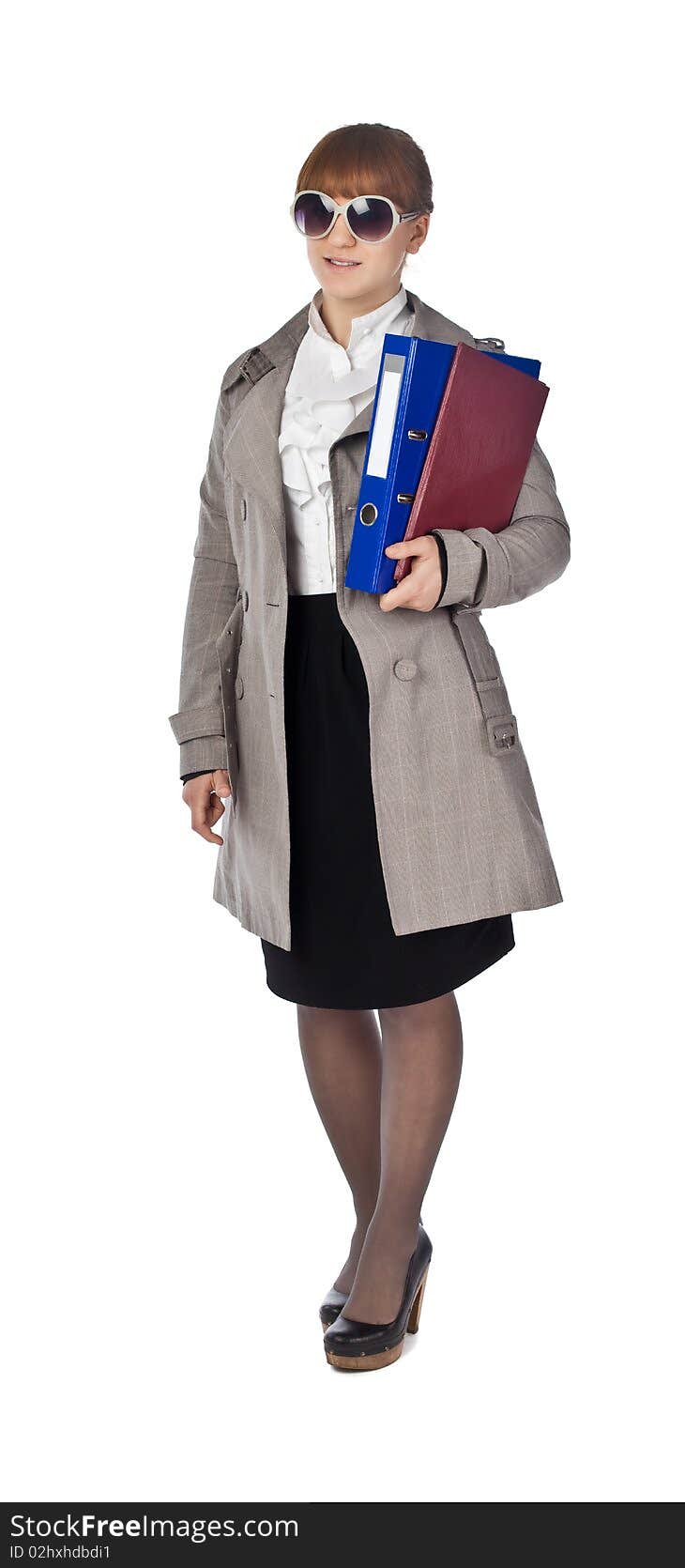 Businesswoman with book in black suit isolated on white background. Businesswoman with book in black suit isolated on white background