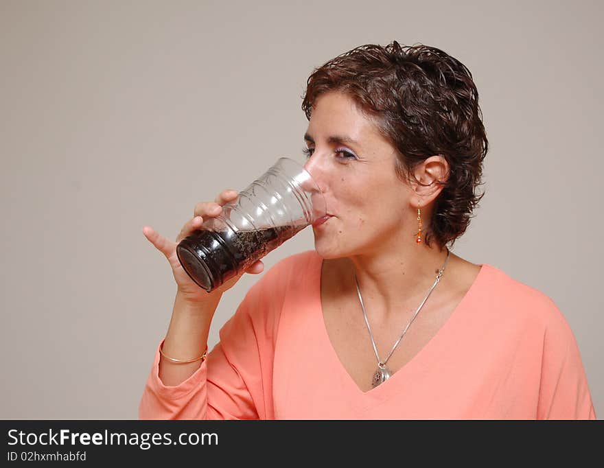 Young Woman Drinking Soda