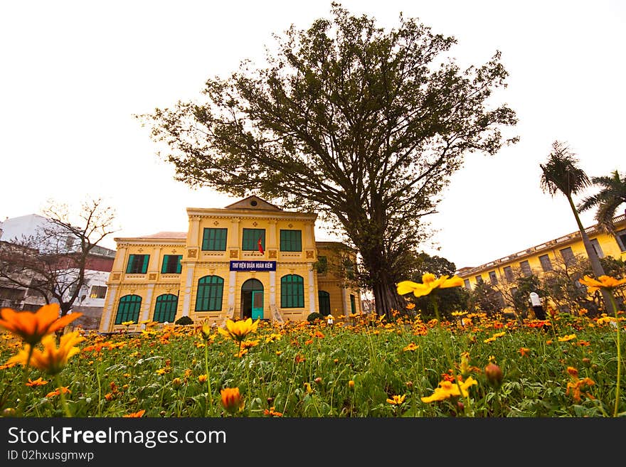 The building rounded by the flower field in Vietnam. The building rounded by the flower field in Vietnam