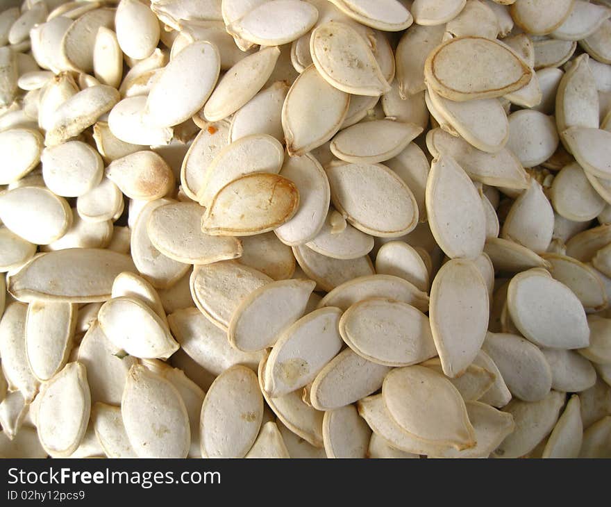 A pile of sunflower seeds on a market