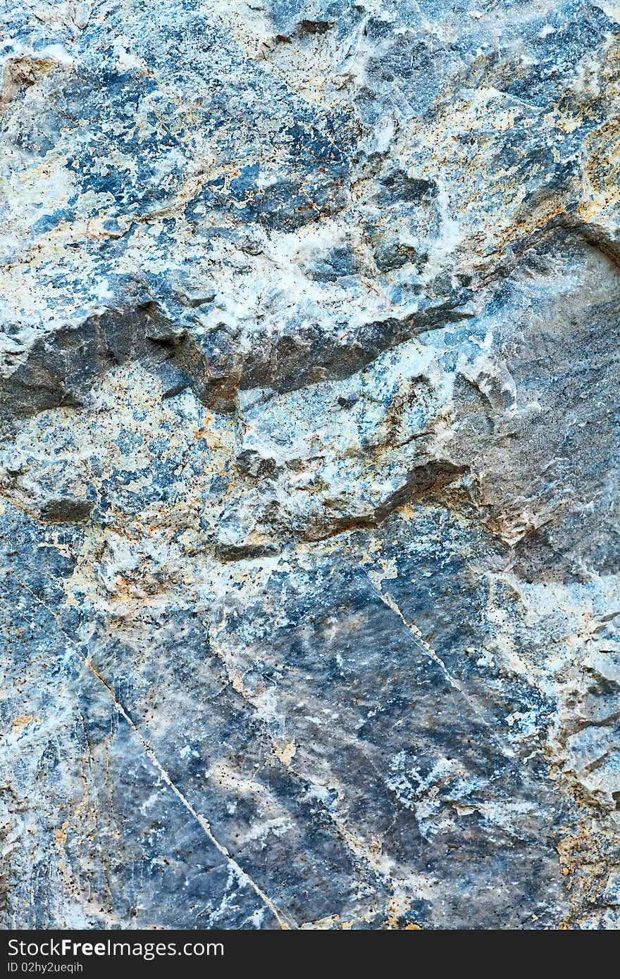 Rough rock surface texture closeup view. Rough rock surface texture closeup view.