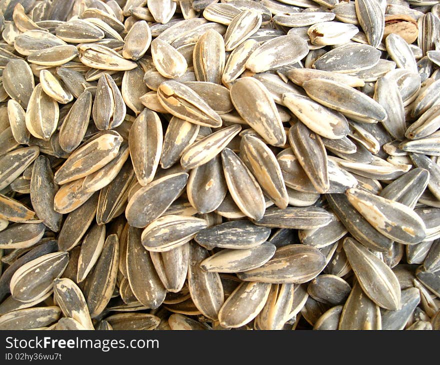 A pile of sunflower seeds on a market