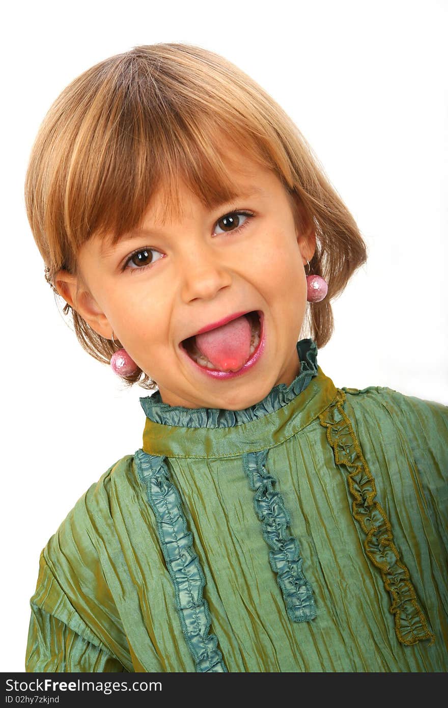 Little showing tongue girl  against white background. Little showing tongue girl  against white background