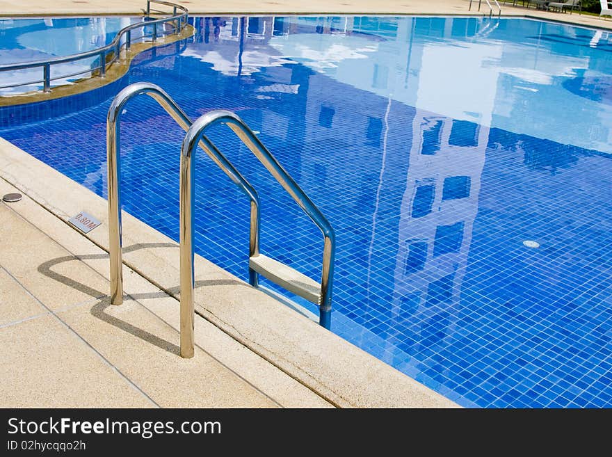 Swimming pool in tropical hotel