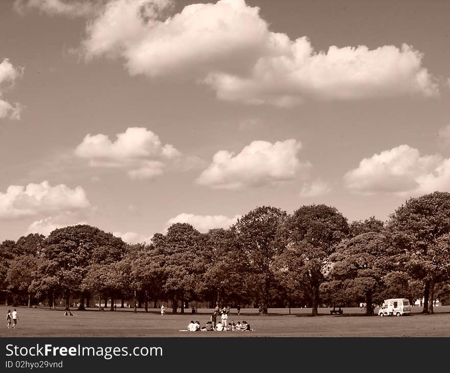 Sepia view of a park with nice clouds. Sepia view of a park with nice clouds.