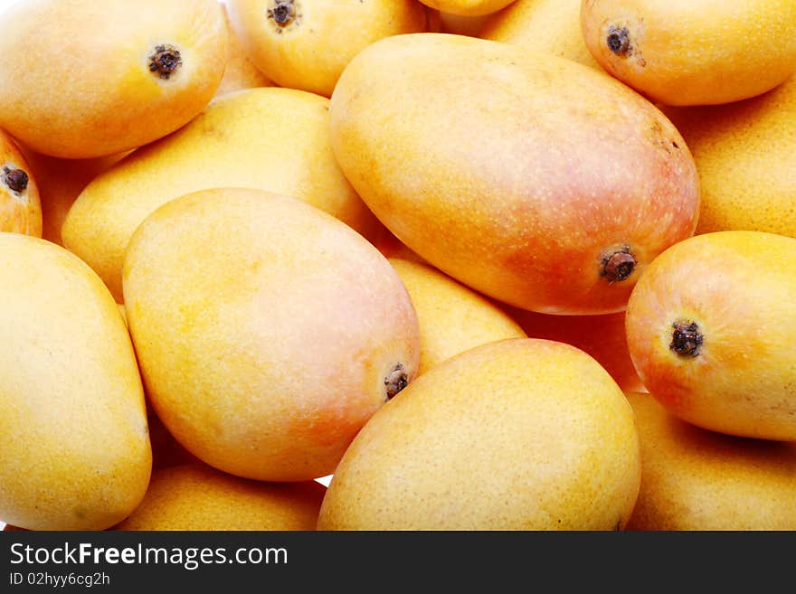 Close-up of some fresh mangoes. Close-up of some fresh mangoes.