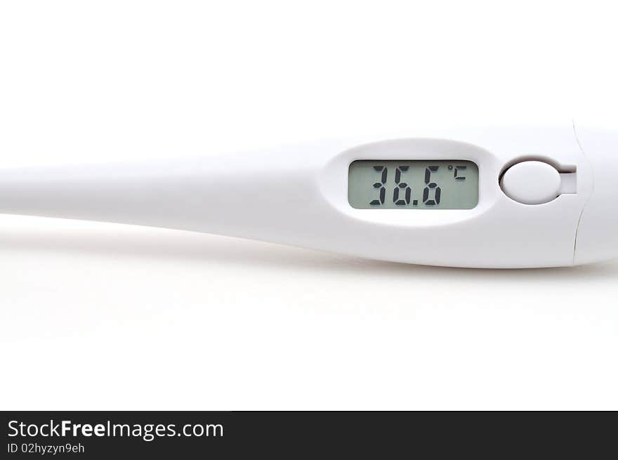 The digital thermometer, showing normal temperature of 36.6 degrees on Celsius. The digital thermometer, showing normal temperature of 36.6 degrees on Celsius.