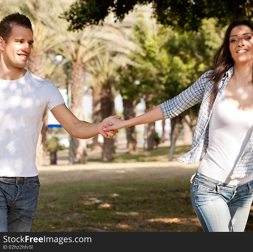 Young couple enjoying in the park