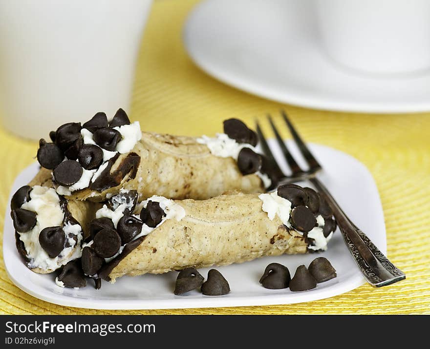 Sweet creamy dessert on a white plate. Sweet creamy dessert on a white plate