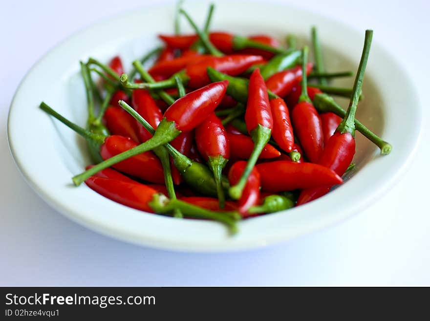 Red hot chillies in a small dish.