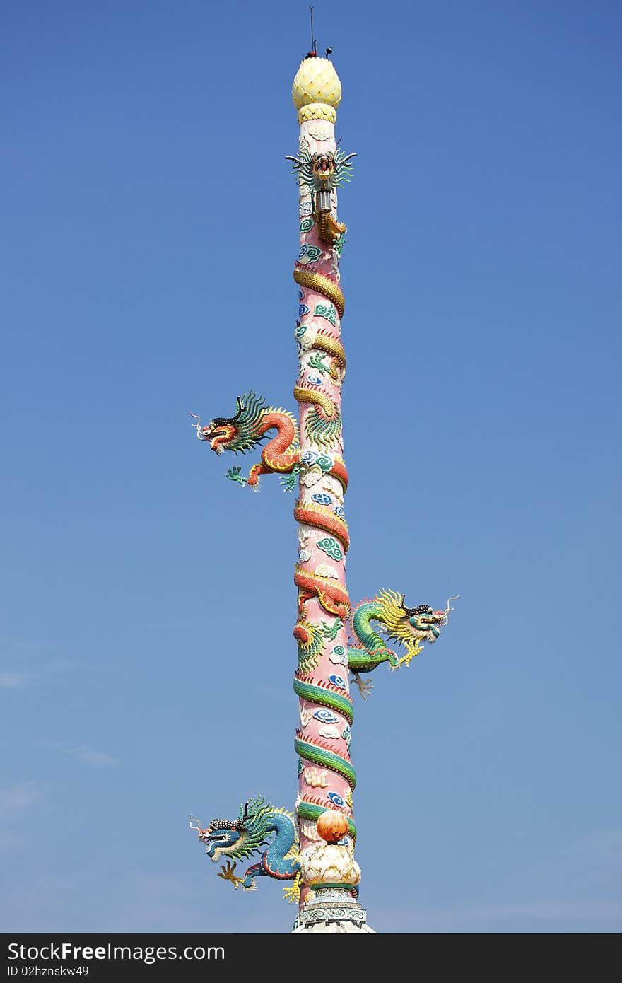 Four chinese dragon on the pole, blue sky. Four chinese dragon on the pole, blue sky