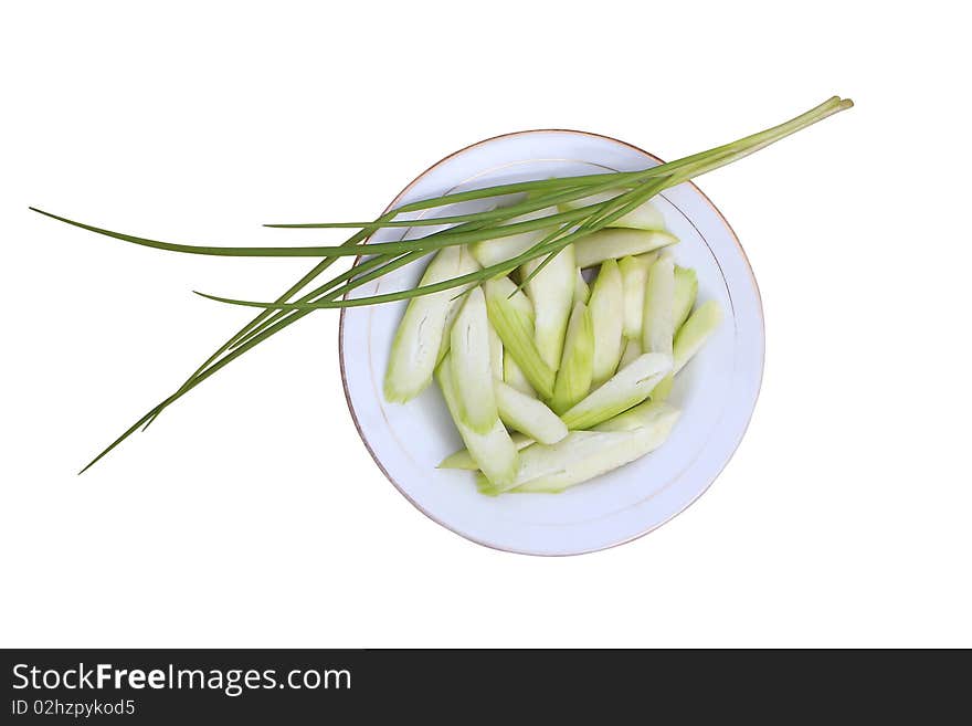 Cut on a plate of sponge, ready to cook. Traditional Chinese vegetable food. Cut on a plate of sponge, ready to cook. Traditional Chinese vegetable food.