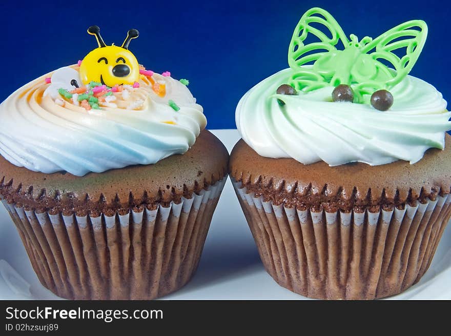 Fun cupcakes with cream meant for little kids. Fun cupcakes with cream meant for little kids