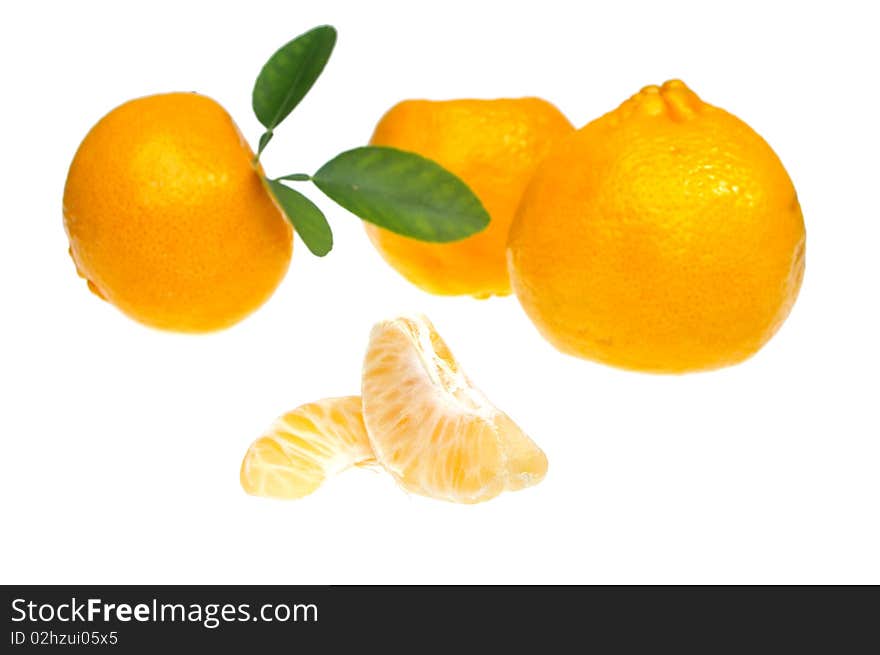 Orange mandarin or tangerine isolated over white