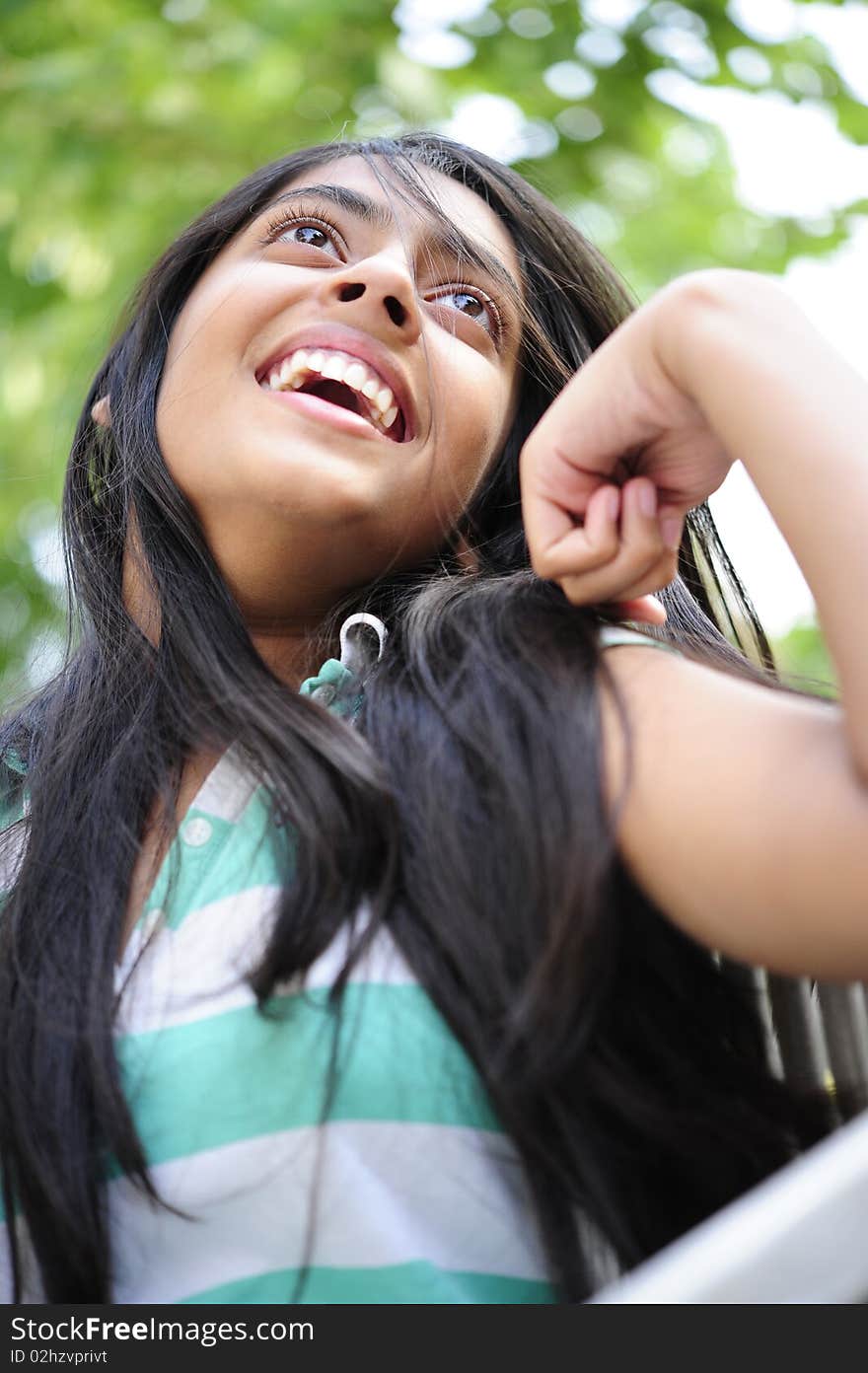 Girl Sitting Outdoors