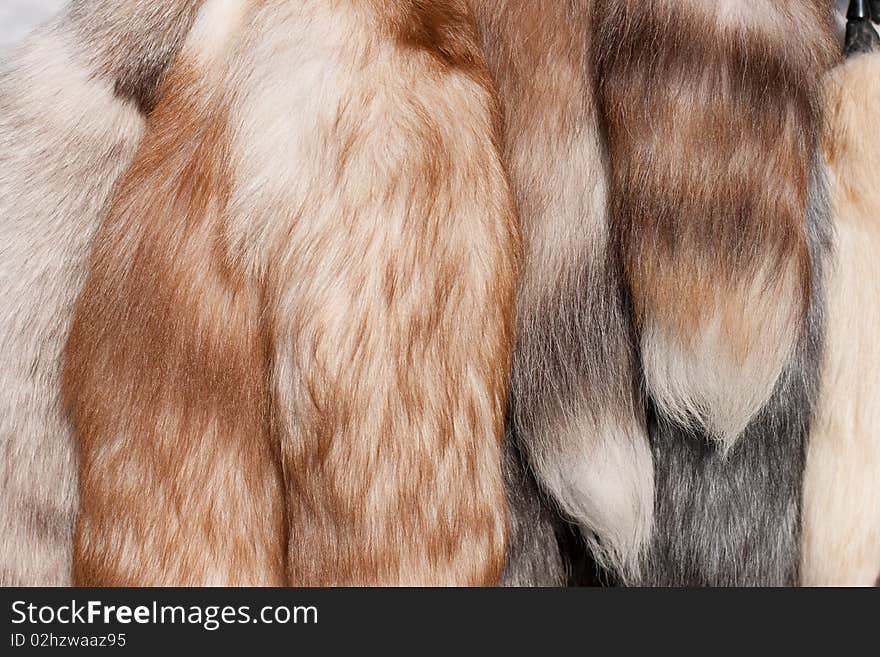 Polar fox fur tails pack closeup. Polar fox fur tails pack closeup