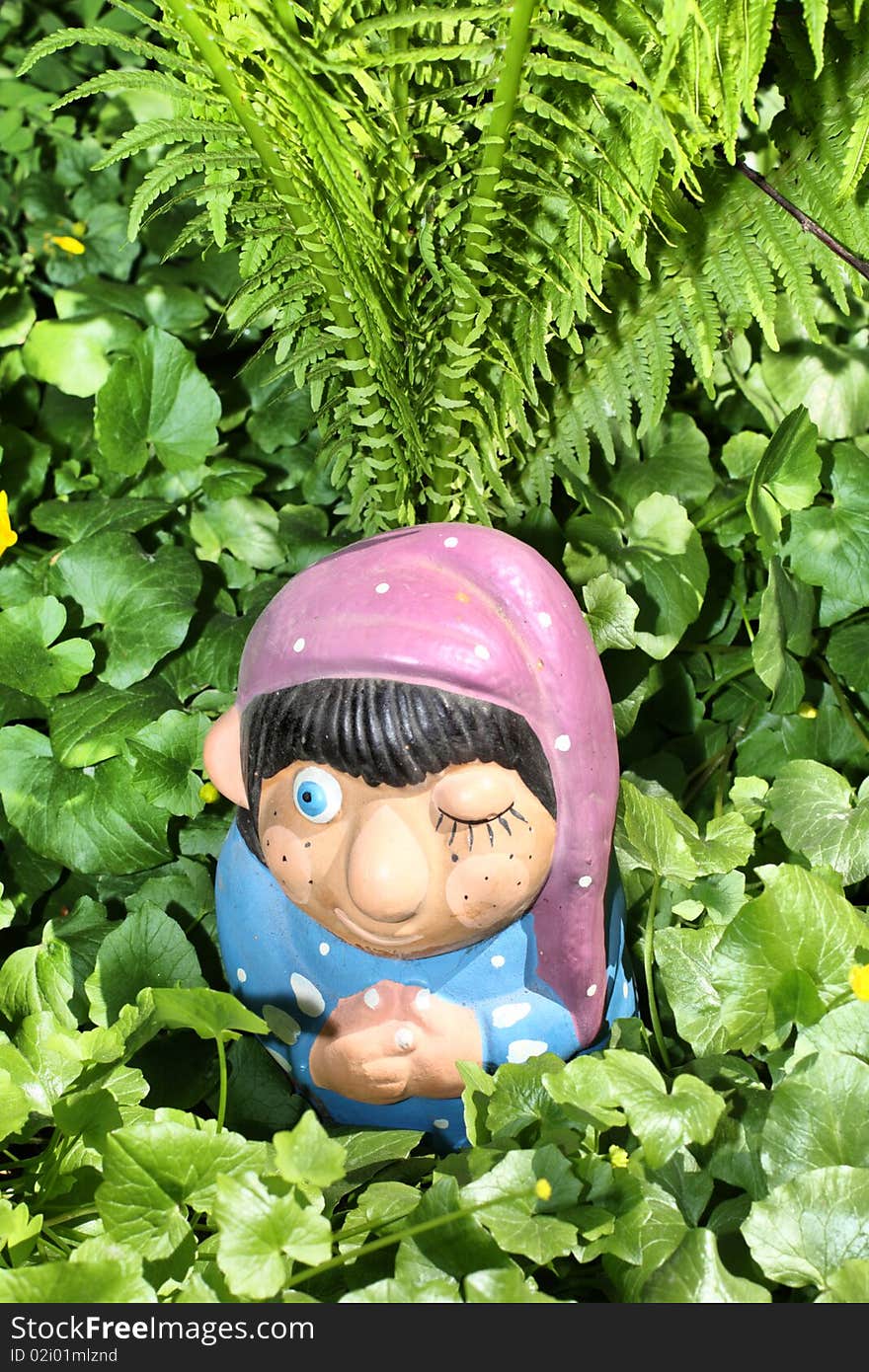 Funny gnome in the garden. Funny gnome in the garden