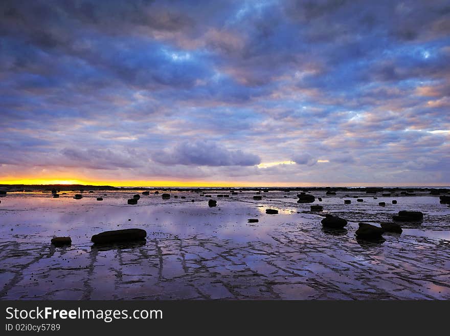 Sunrise in Long Reef, Sydney, near Dee Why beach. These rocks looks funny. Sunrise in Long Reef, Sydney, near Dee Why beach. These rocks looks funny.