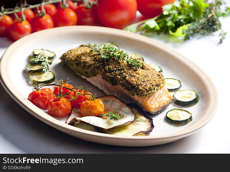 Baked salmon with herbs eschar