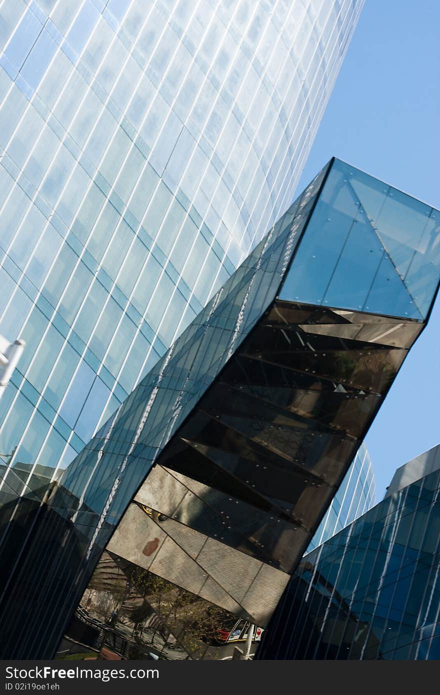 Perspective of glass covered modern office building in Barcelona. Perspective of glass covered modern office building in Barcelona