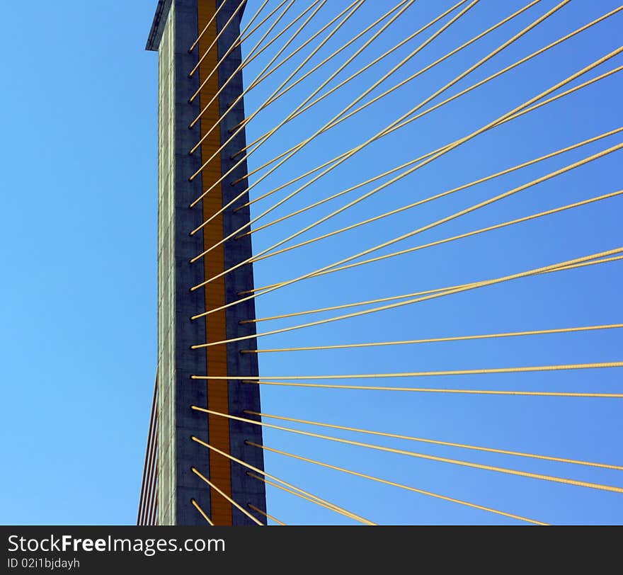 Detail of cable-stayed bridge, with yellow cables