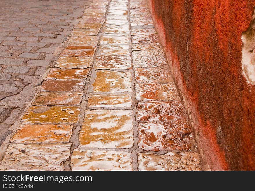 Color stone street after the rain in historic San Miguel de Alende Mexico. Color stone street after the rain in historic San Miguel de Alende Mexico