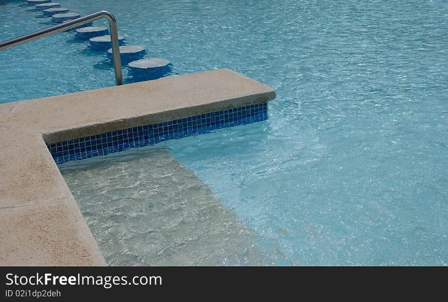 Pool ladders in a summer, water