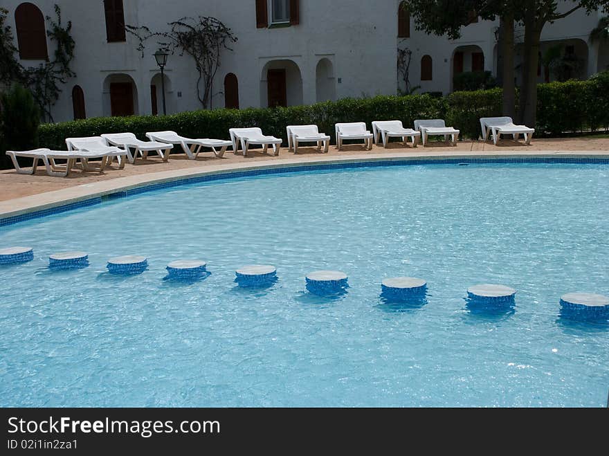 Pool ladders in a summer, water