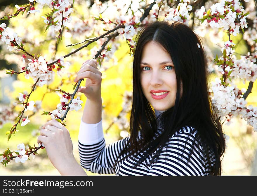 Young girl in spring garden. Young girl in spring garden