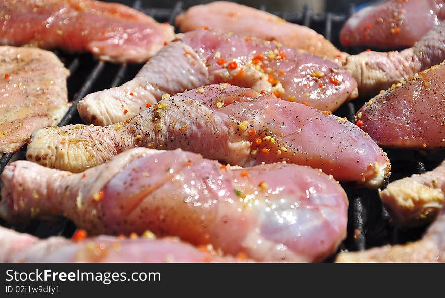 Chicken Legs on the grill with barbecue. Chicken Legs on the grill with barbecue