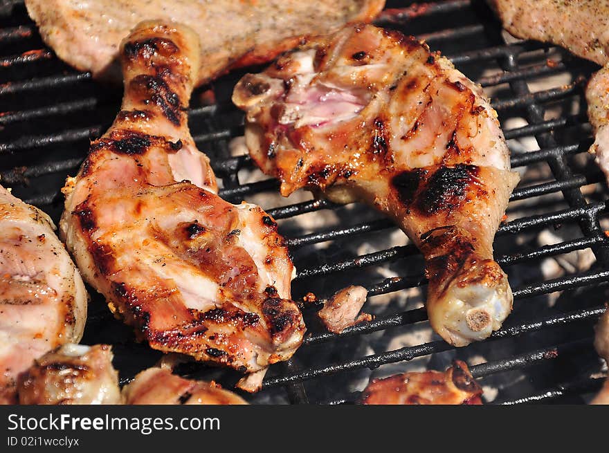 Chicken Legs on the grill with barbecue. Chicken Legs on the grill with barbecue