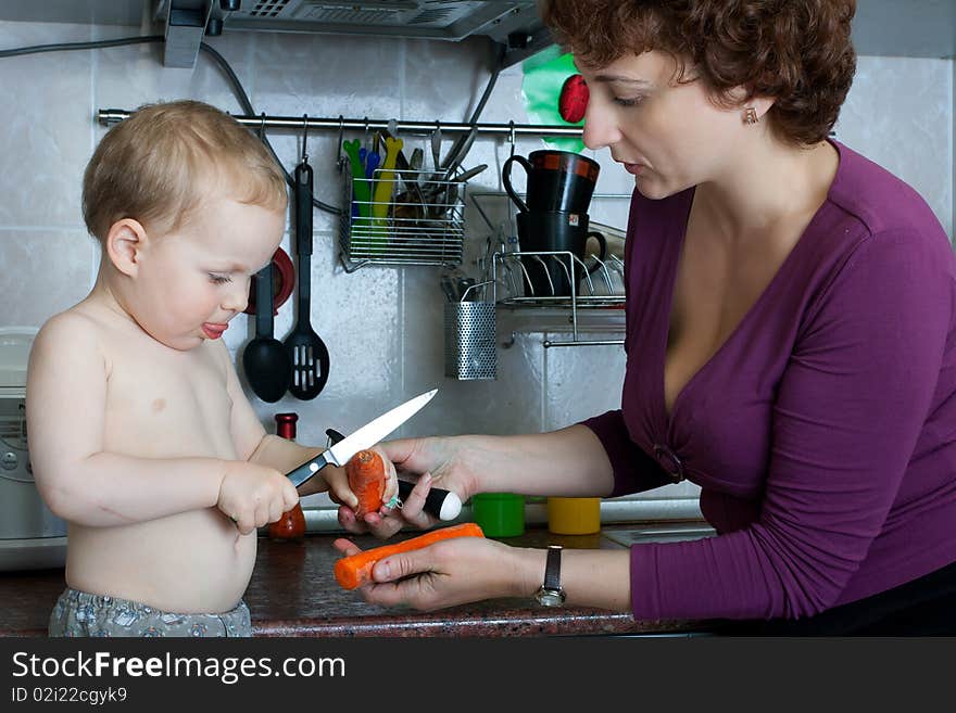 Mother and son cooking