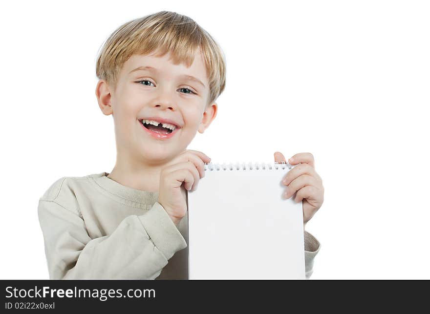 Cute little blond boy holding the notebook. Cute little blond boy holding the notebook