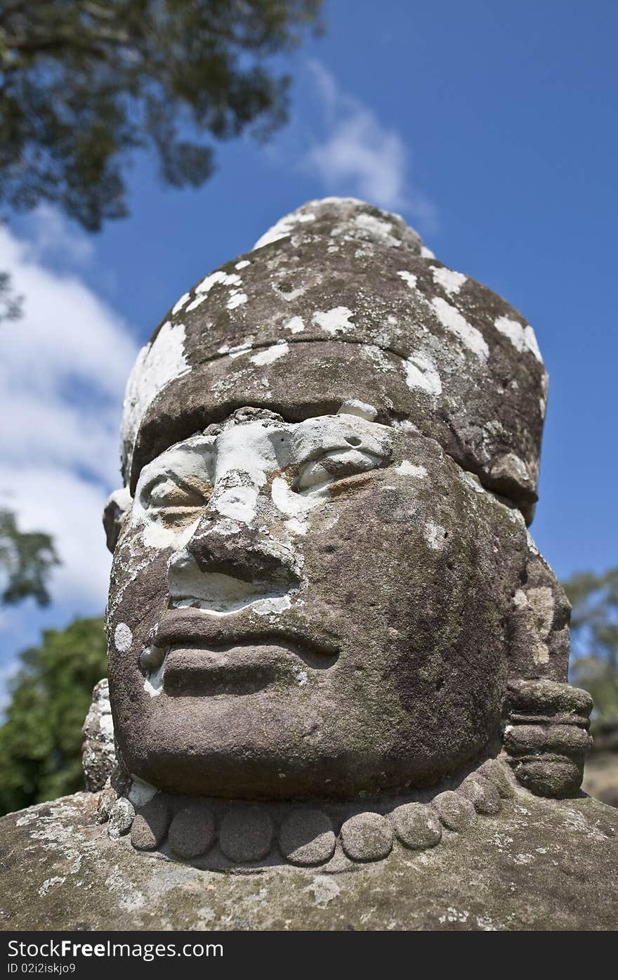 Heads of the guardians of Angkor Thom within the Angkor Temples, Cambodia