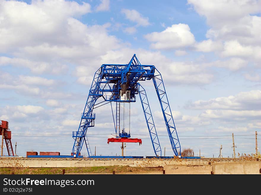 The container Terminal at railway station on a background of the dark blue sky